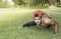 Young fit Caucasian man with muscular body doing push-ups outdoors on sunny summer day Royalty Free Stock Photo