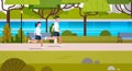 Young Fit Couple Jogging Outdoors In Modern Public Park Sport Activities