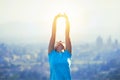 Young fit healthy sportswoman at the mountain or hill top in Murcia, Spain. Beneficial habits and lifestyle. Girl watching sunset