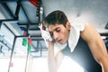 Young fit hispanic man in black sleeveless shirt in gym Royalty Free Stock Photo