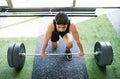 Young fit hispanic man in gym lifting heavy barbell Royalty Free Stock Photo