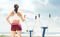 Young, fit and sporty girl training in outdoor gym. Fitness, sport and healthy lifestyle. Royalty Free Stock Photo