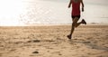 Fitness female runner running at beach Royalty Free Stock Photo