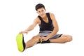 young fitness man sitting and making stretching exercise Royalty Free Stock Photo