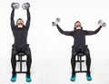 Young fitness man is sitting on a weight bench working out with dumbbells isolated on white background. Fitness exercises with Royalty Free Stock Photo