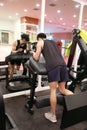 Asian chinese man in gym Ã¯Â¼ÅFitness sport man Training of leg strength in the gym Royalty Free Stock Photo