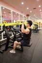 Asian chinese man in gym Ã¯Â¼ÅFitness sport man Training strength in the gym Royalty Free Stock Photo