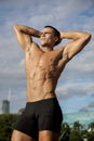 Young fitness trainer showing his muscels Royalty Free Stock Photo