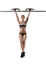 Young fitness woman chin-up on horizontal bar