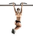 Young fitness woman chin-up on horizontal bar