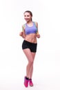 Young fitness woman with healthy sporty figure with skipping rope Royalty Free Stock Photo