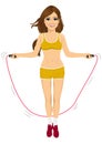 Young fitness woman jumping rope