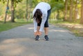 Young fitness woman legs walking in the park outdoor, female runner running on the road outside, asian athlete jogging and exercis Royalty Free Stock Photo