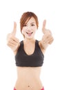 Young fitness woman with thumbs up Royalty Free Stock Photo