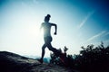 woman trail runner running to mountain top Royalty Free Stock Photo