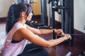 Young fitness woman working out in the gym Royalty Free Stock Photo