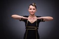 The young flight attendant on gray background Royalty Free Stock Photo