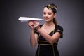 The young flight attendant on gray background Royalty Free Stock Photo