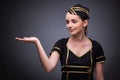 The young flight attendant on gray background Royalty Free Stock Photo