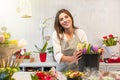 Young florist woman in a flower shop Royalty Free Stock Photo