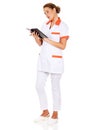 Young focus female doctor or nurse makes notes Royalty Free Stock Photo