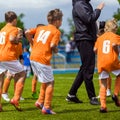 Young Fooball Players Training and Warming Up Before the Final Football Match