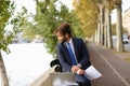 Arabian student preparing before exams near Eiffel Tower with la