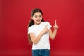 Young and free. Happy child girl with long hair on red background. Happiness and joy. Positive emotions. Child care and Royalty Free Stock Photo