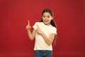 Young and free. Happy child girl with long hair on red background. Happiness and joy. Positive emotions. Child care and Royalty Free Stock Photo