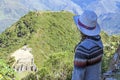 Young free woman travel alone in Andes mountains in Peru. Landscape with solo female tourist, mountains and copy space Royalty Free Stock Photo