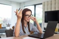 Young freelancer woman communicate online by laptop