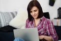 Young freelancer woman using laptop.Happy smiling girl working o