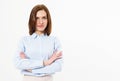 Young friendly successful brunette woman with crossed arms posing on a white background. Business woman with beautiful features Royalty Free Stock Photo