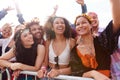 Young Friends In Audience Behind Barrier At Outdoor Music Festival Posing For Selfie Royalty Free Stock Photo