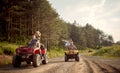 Young friends driving a off road buggy car Royalty Free Stock Photo