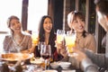 Young friends eating hot pot in restaurant Royalty Free Stock Photo