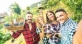 Young friends having fun taking selfie at winery vineyard outdoor - Friendship concept on happy people enjoying harvest together