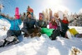 Young friends on mountain enjoying on winter day Royalty Free Stock Photo