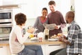 Young Friends Preparing Breakfast In Kitchen Royalty Free Stock Photo