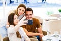 Young friends taking selfie while sitting at cafe Royalty Free Stock Photo