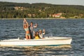 Young friends enjoying summer on speed boat Royalty Free Stock Photo