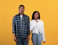 Young frightened african american couple feeling terrified