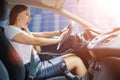 Young frightened driver woman tooting horn Royalty Free Stock Photo