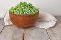 Young frozen green peas on wooden table viewed from above. Green pea pod table peas. Closeup of fresh green peas Pisum sativum Royalty Free Stock Photo