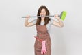 Portrait of young attractive smiling brunette caucasian housewife on white background. Beautiful housekeeper woman