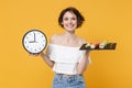 Young fun woman girl in casual clothes hold in hand clock makizushi sushi roll served on black plate traditional