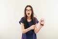 Young fun woman in glasses with alarmclock. Emotion Royalty Free Stock Photo