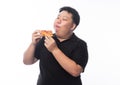 Young Funny Fat Asian man eating hawaiian pizza isolated on white background Royalty Free Stock Photo