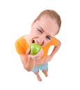 Young funny girl eat apple Royalty Free Stock Photo