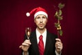 Young funny guy with christmas hat Royalty Free Stock Photo